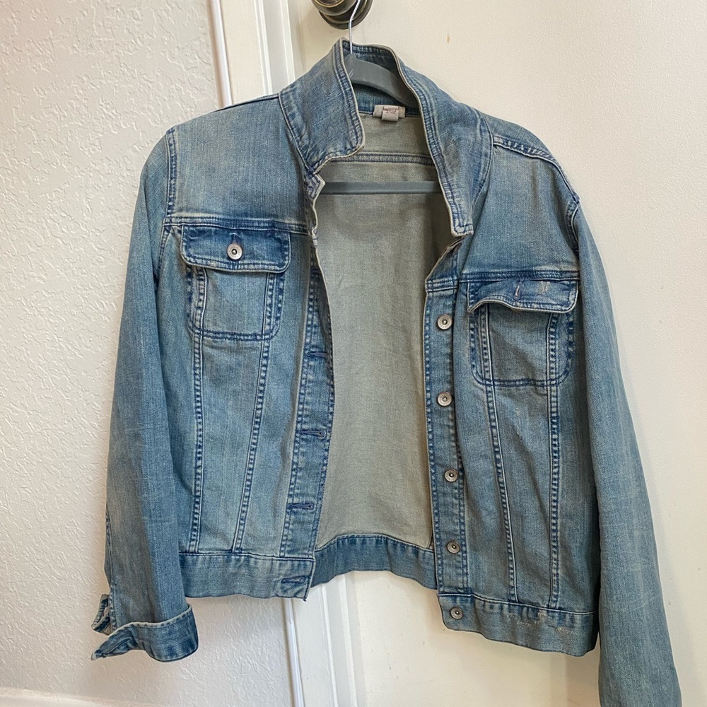 Distressed denim jacket